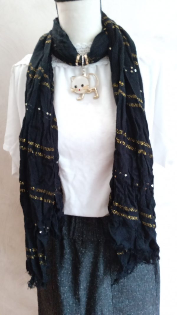Foulard noir et doré avec chat doré.
