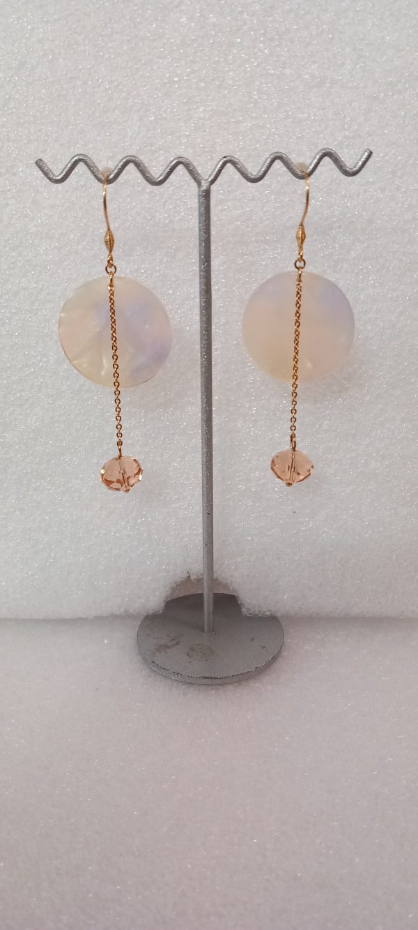 Boucles d'oreilles en acétate, et en acier inoxydable 316.